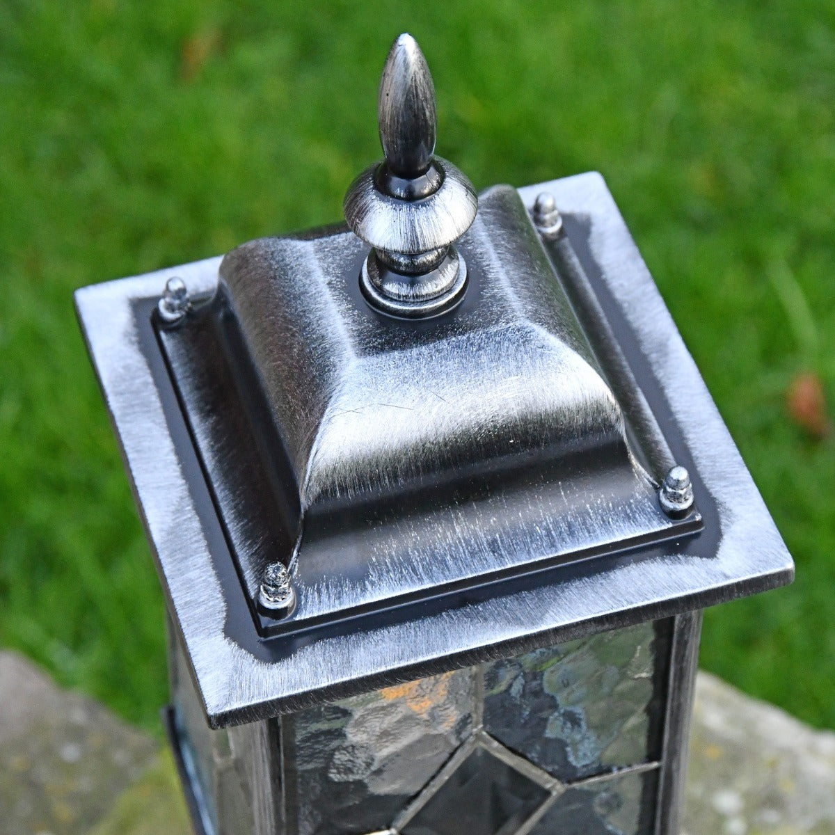 Close up of lantern square top and finial 
