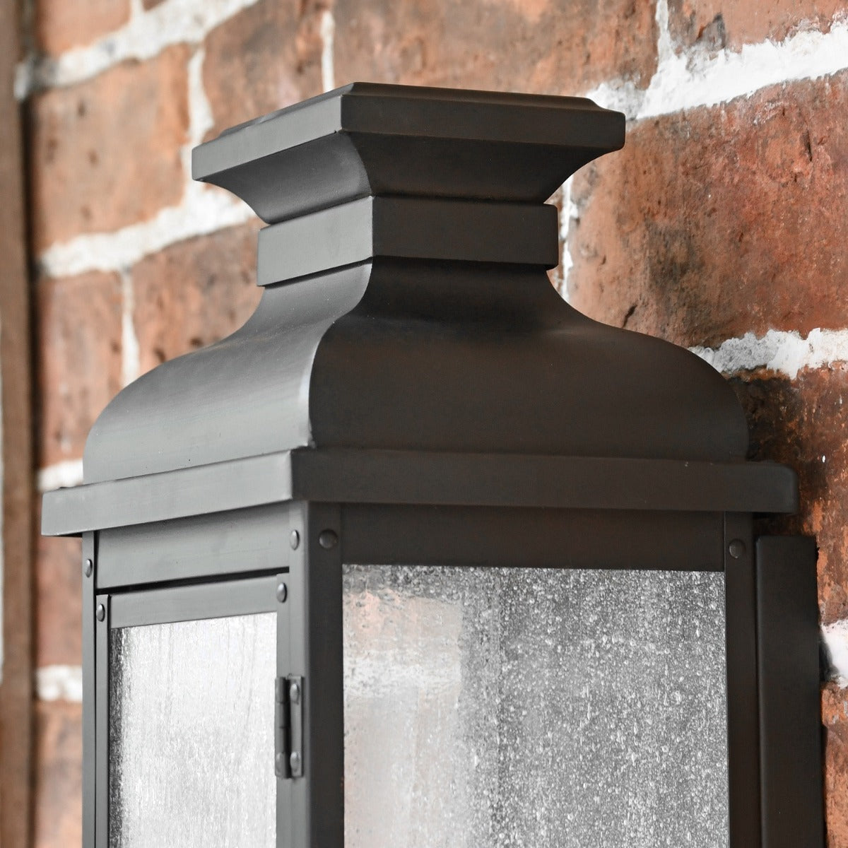 Close up of 'Terrington' Wall Lantern in Antique Copper finish