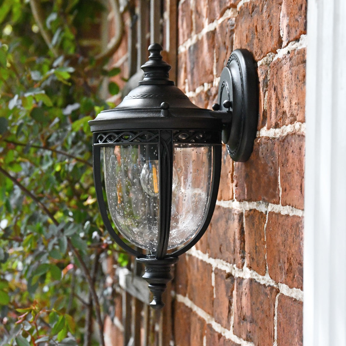 "The Moulton" Black Top Fix Traditional Wall Lantern On Brick Wall