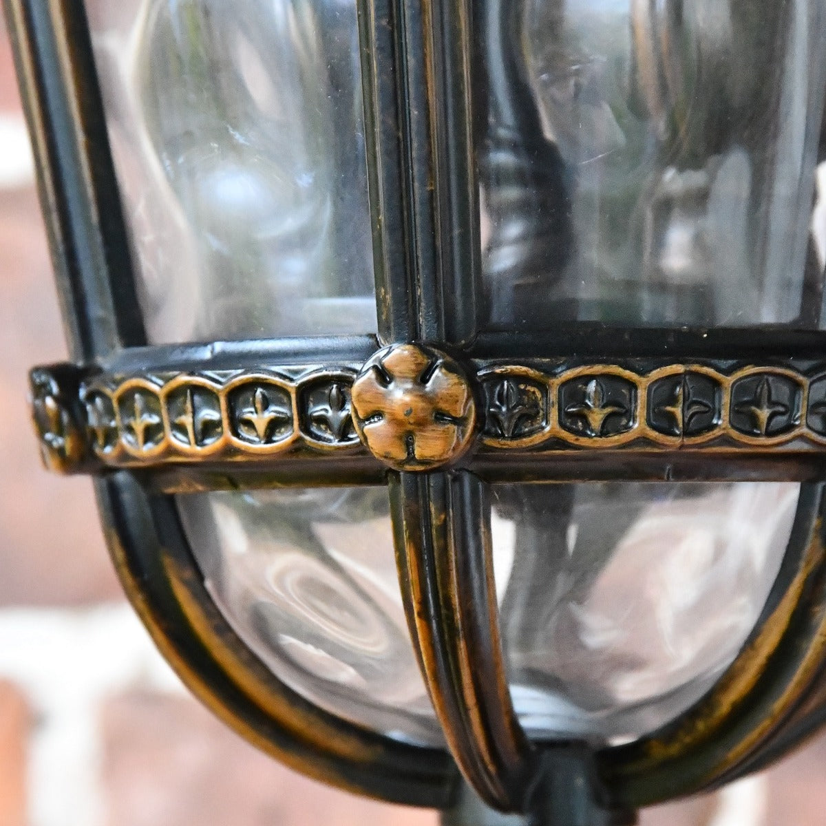 Close up of fleur de lys detailing and rose motif 