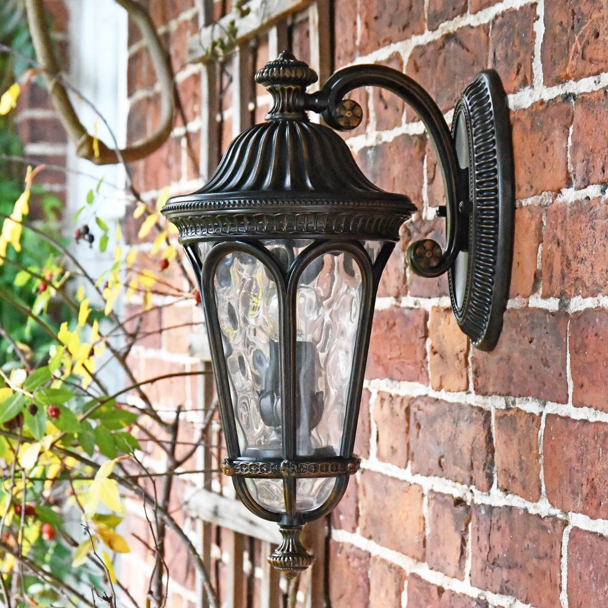 Side view of Bronzed Resplendent Wall Lantern on Wall 