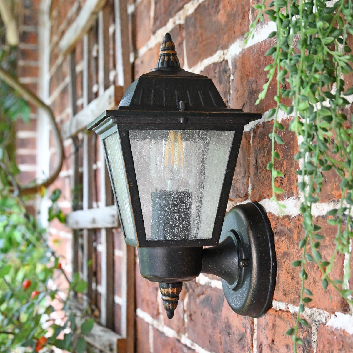 Side view of Vintage Bronze Wall Lantern with textured panes 