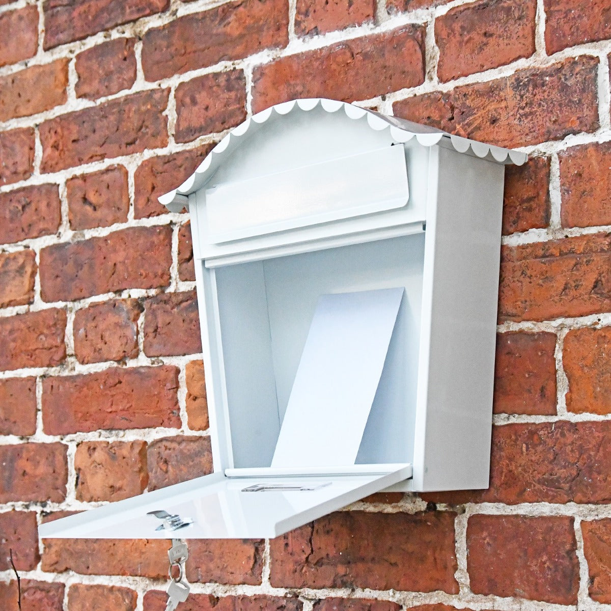 Traditional lockable post box with door open