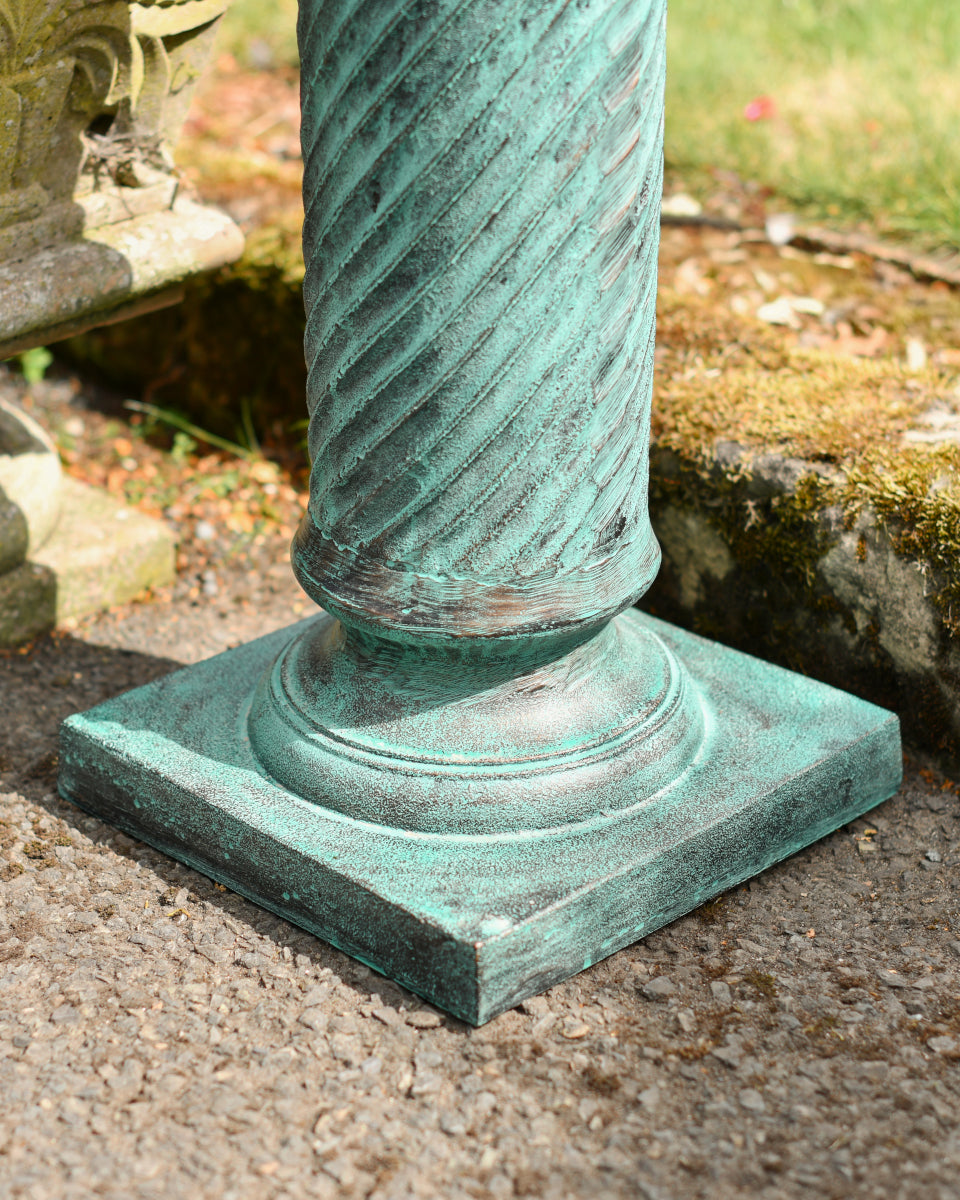 Bottom of the verdigris pillar