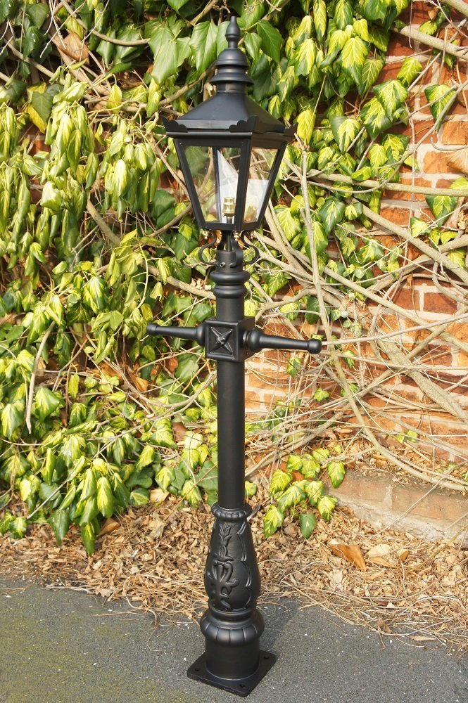 Miniature Victorian Lamp Post set in Use Next to a House