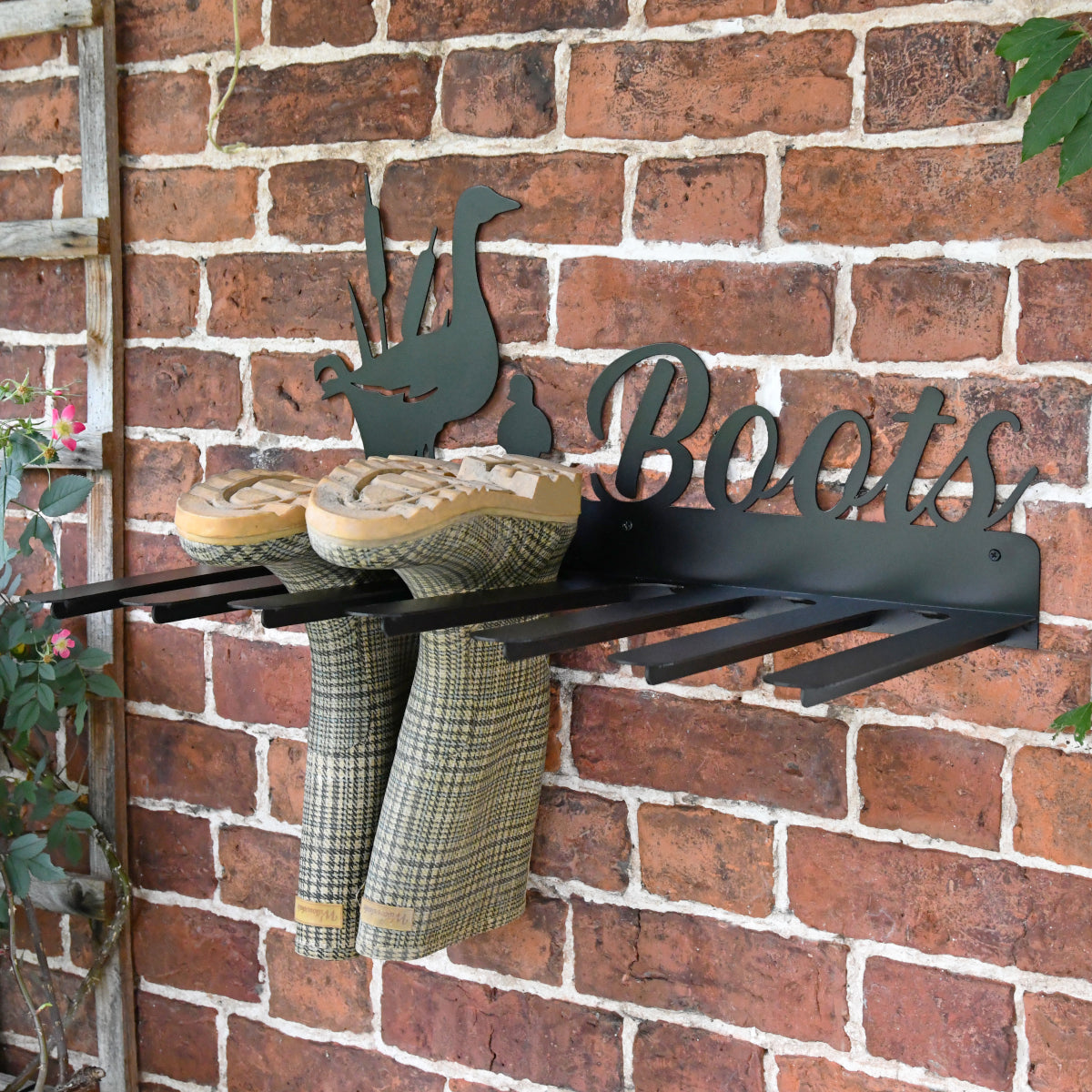 Scale shot of the wellies placed on the holder