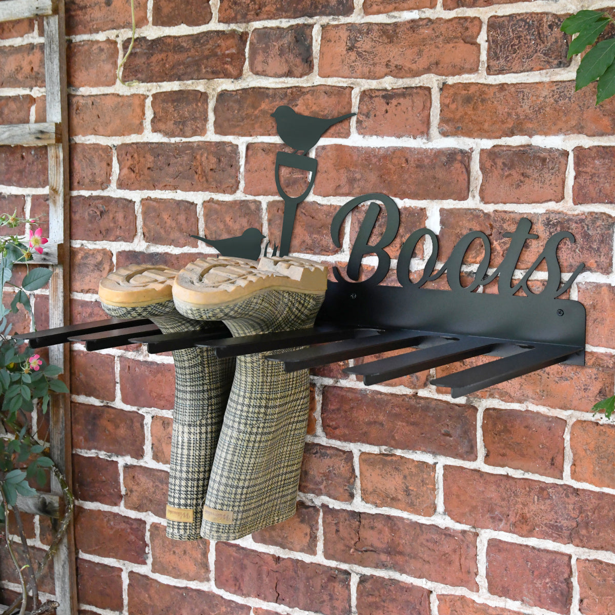 Example of wellies being placed on the rack