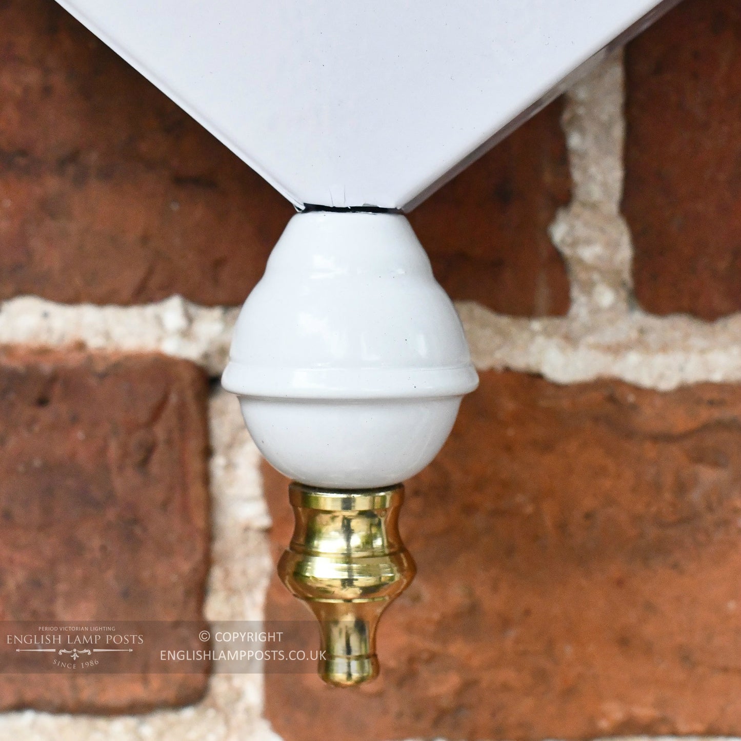 White Flush Traditional Porch Wall Lantern Close Up On Bottom Finial