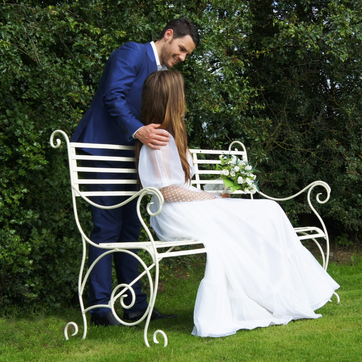Bridge and groom on cream westminster bench