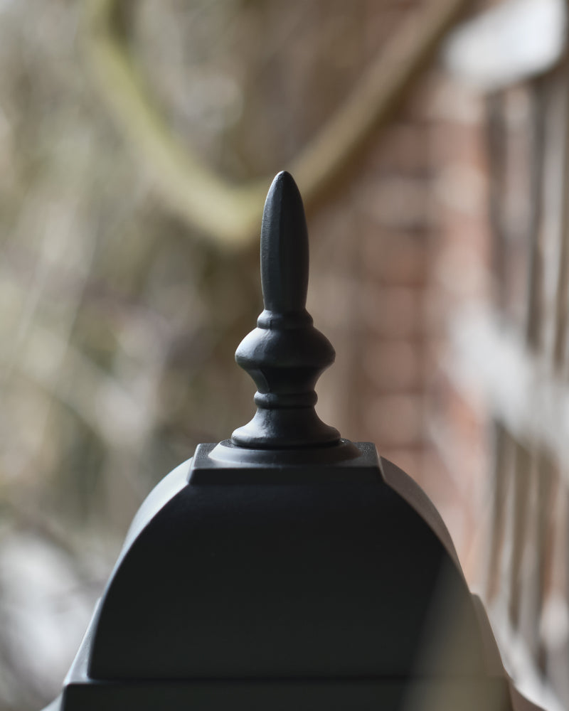 Close up of the ornate spike at the paex of the design 