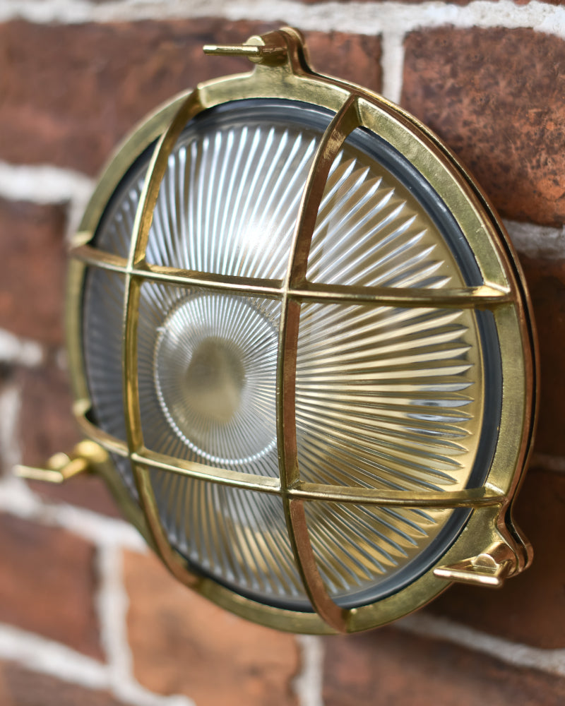 Side profle of  the caged wall mountable outdoor light 
