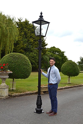 large black cast iron lamp post with rochester lantern