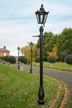 Black Six Sided Victorian Lamp Post On Garden Edge