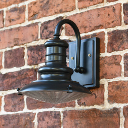 Black Vintage station lantern on brick wall