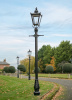 Large Victorian Lamp Post Lining A Garden Edge