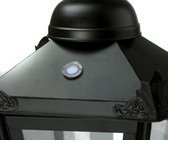 Garden lantern with light sensor
